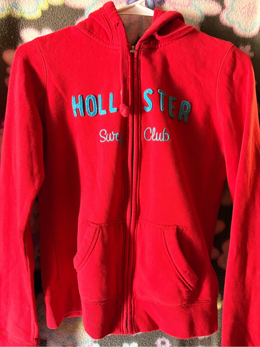 Hollister Red Full‑Zip Hooded Sweatshirt with Blue Logo